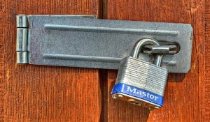 image of latch and padlock - unlock the secrets of how to Improve Your Sales Copy With These Four Easy Copywriting Tips